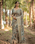 Charming Sea Green Colored Jacquard Silk Saree With Zari Border Blouse Piece