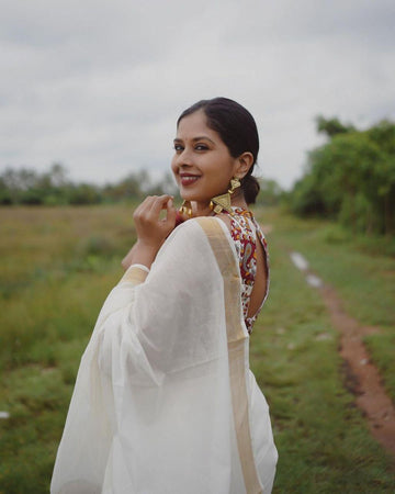 estival Saree in White Soft Linen Silk With Wooven Pallu and Blouse