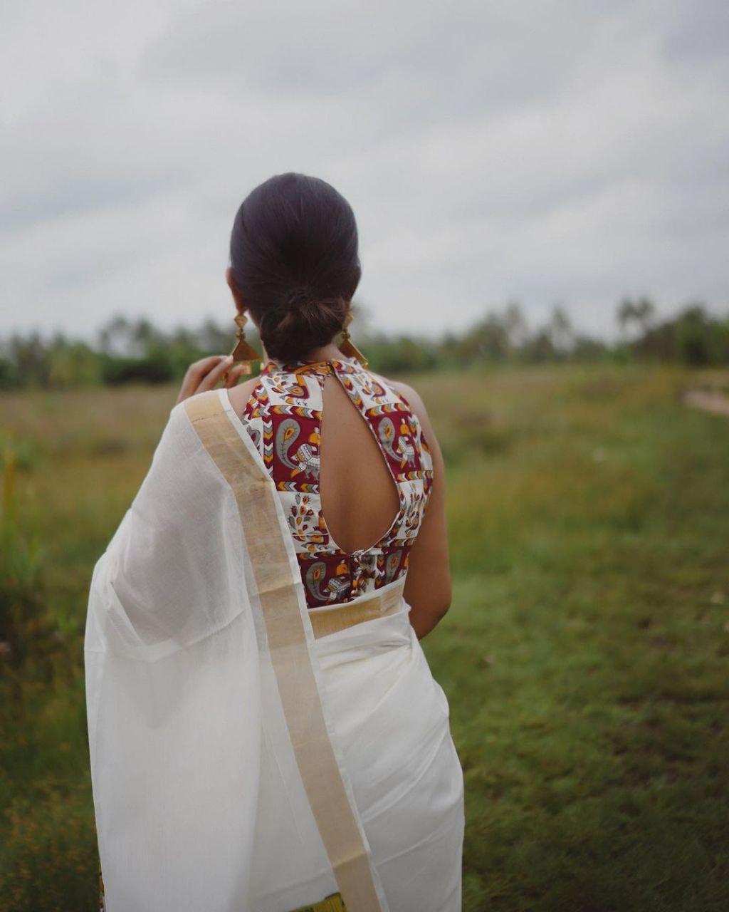 estival Saree in White Soft Linen Silk With Wooven Pallu and Blouse - Ibis Fab