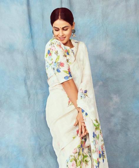 Pure Linen saree in white radiant festive wear