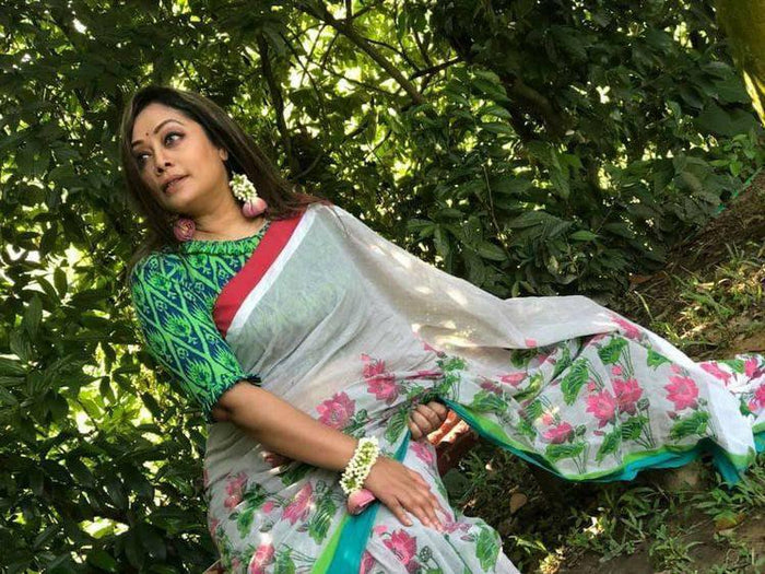 White and Green colored Linen Designer Printed Saree