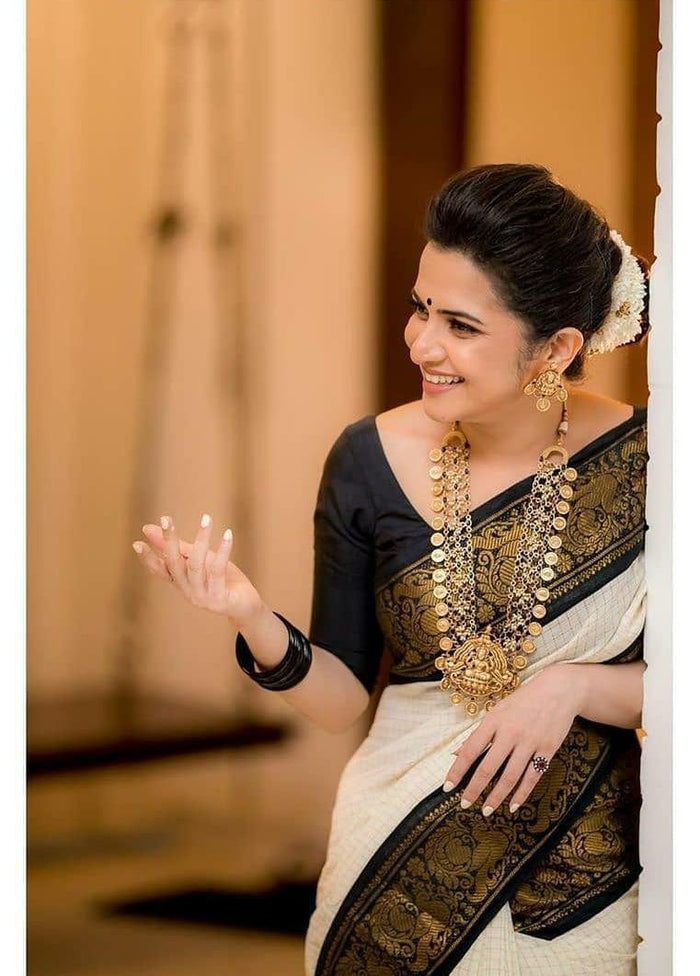 White Colour Soft lichi Silk Golden And Golden Jari With Heavy Jaquard Border